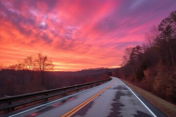 Fototapeta premium scenic highway with view of the sunrise, with pink and orange hues in the sky, created with generative ai