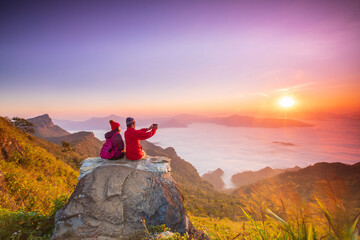 The lover  hiking on Phu Chee Duean mountain, border of Thailand and Laos, Chiang Rai province, Thailand.