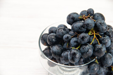 front close view fresh black grapes juicy mellow fruits on the white background fruit fresh mellow juice