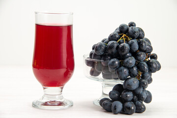 front close view fresh black grapes juicy mellow fruits with juice on white desk fruit fresh mellow juice