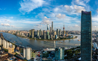 Aerial view of city skyline and modern buildings in Shanghai, China.