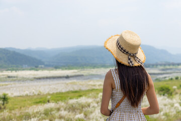 Travel woman look at the Huoyan Mountain in Taichung of Taiwan