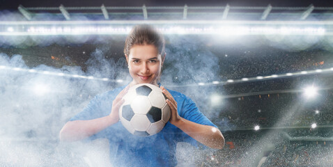  Portrait of young female soccer player with soccer ball at double exposure stage background with smoke.