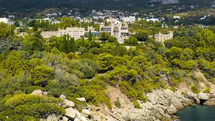 Fototapeta na wymiar Alupka, Crimea - September 8, 2020: Vorontsov Palace. 19th century Gothic mansion with well-preserved halls and a picturesque 40 hectare park. The palace was built from 1828 to 1848, Aerial View