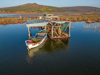 Fototapeta na wymiar Gediz delta fishermen live in the river among the reeds.