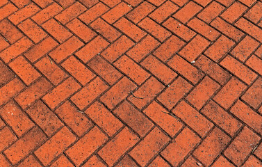 Patterned paving with red bricks