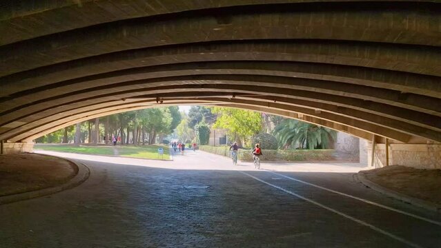 Spring walk in Turia Park in Valencia. Beautiful bridges and many places for outdoor activities on a sunny day
