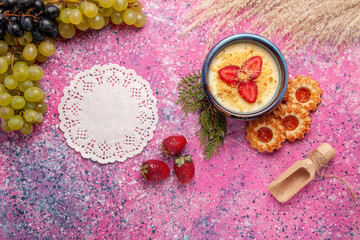 Fototapeta na wymiar top view delicious creamy dessert with fresh green grapes and cookies on light pink background dessert ice-cream berry cream sweet fruit