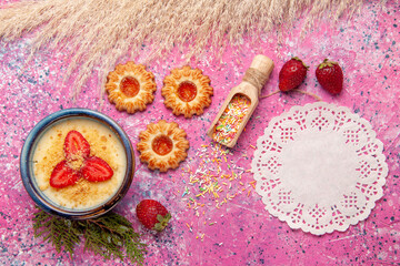 top view delicious creamy dessert with red sliced strawberries and cookies on light-pink background dessert ice-cream cream sweet berry fruit