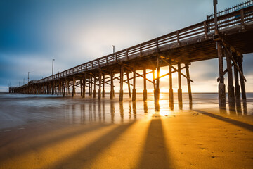 Fototapeta na wymiar the newport beach pier during sunset, california