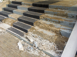 Destroyed span of low-quality concrete stairs