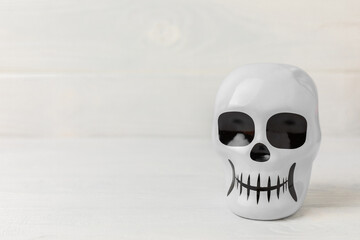Halloween candy and sugar skull on a white background. Classic sweet Halloween candy treats....