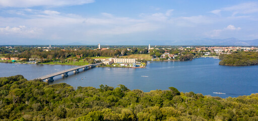 Obraz premium Aerial view of Sabaudia, in the province of Latina, Italy. In the foreground, Lake Paola.