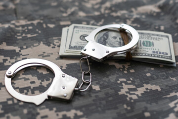 military uniform and handcuffs, money.