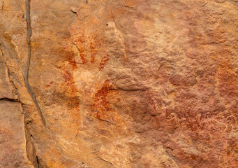 Handprint in Ancient rock art at Burrungui or Burrungkuy (Nourlangie), Arnhem Land Escarpment, Kakadu National Park, Northern Territory, Australia