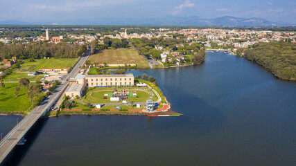 Aerial view of Sabaudia, in the province of Latina, Italy. In the foreground, Lake Paola.