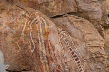 Ancient rock art at Burrungui or Burrungkuy (Nourlangie) in caves and shelters, Arnhem Land Escarpment, Kakadu National Park, Northern Territory, Australia - obrazy, fototapety, plakaty