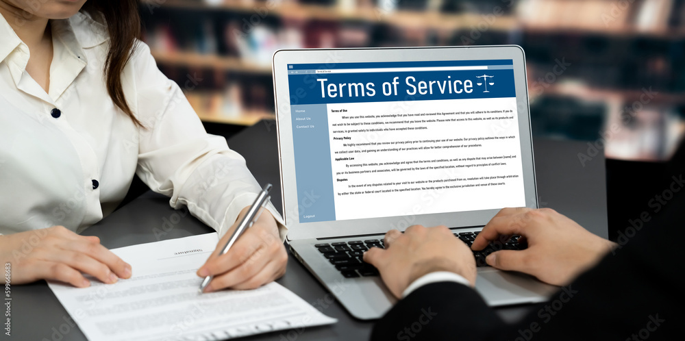 Poster online term of service conditions showing astute rules and regulations in using the website on a lap