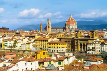 Fototapeta premium Panoramic view of old town of Florence with Dome of Florence Duomo or Basilica di Santa Maria del Fiore cathedral, Tuscany. Italy in a beautiful summer day