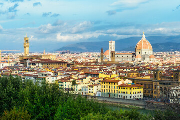 Fototapeta na wymiar Panoramic view of old town of Florence with Dome of Florence Duomo or Basilica di Santa Maria del Fiore cathedral, Tuscany. Italy in a beautiful summer day