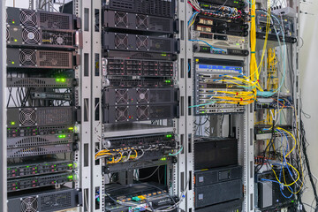 There are many different servers in the racks of the data center. This is the technical platform of a large Internet provider