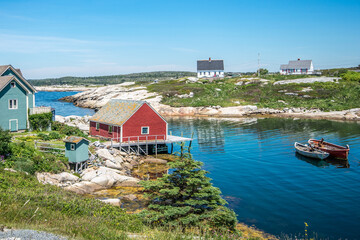 Fototapeta na wymiar Houses along the rocky shore of a fishing village off the Atlantic coast.