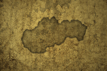 map of slovakia on a old vintage crack paper background .