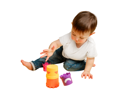 Toddler baby is playing logical educational games with a sandbox mold on a studio isolated on a white background. Happy child playing with an educational toy bucket. Kid aged one year four months