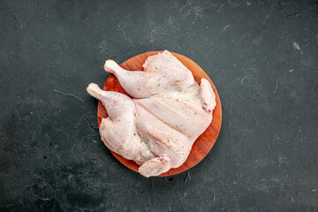 top view fresh chicken on dark background cooking dish food salad color dinner bird barbecue