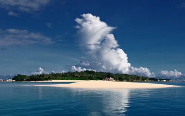 Beautiful Island white sand, with blue sky and nice clouds