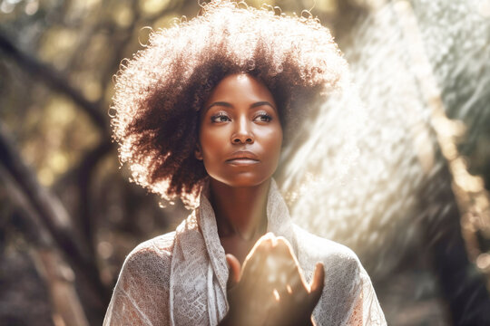 Portrait Of Spiritual Black Woman Healing Energy In Hands. 