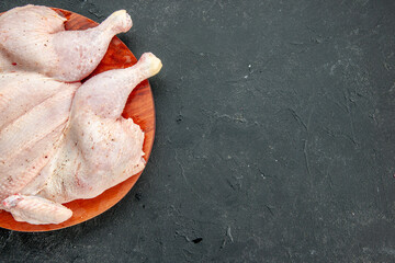 top view fresh raw chicken on dark background cooking dish food salad barbecue color dinner bird free space for text