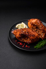 Delicious fried sea bass fish in the form of slices with spices and herbs