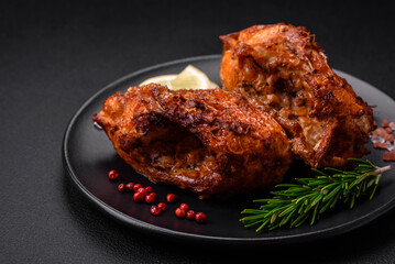 Delicious fried sea bass fish in the form of slices with spices and herbs