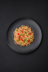Delicious fresh Asian noodles with vegetables, salt, spices and herbs