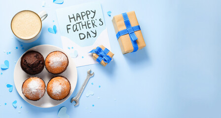 Happy Father's Day Concept, Greeting card, Father's Day Breakfast with morning coffee, muffins, gift boxes, letter on light blue background
