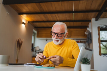 Senior caucasian Man Enjoy Breakfast at Home with Jam and Biscuit