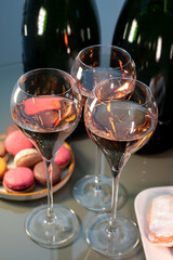 Tasting of rose brut Champagne sparkling wine in cellars of gran cru wine house in Epernay, wine tour in Champagne, France