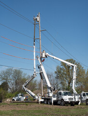 Electrical Crew Work on Replacing Utility Pole, Vertical