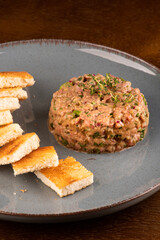 portion of raw meat tartare with spices