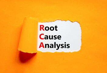 RCA root cause analysis symbol. Concept words RCA root cause analysis on white paper. Beautiful orange table orange background. Business and RCA root cause analysis concept. Copy space.