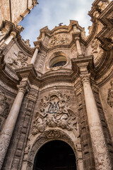 Obraz premium Metropolitan Cathedral - Basilica of Assumption of Our Lady of Valencia (or Saint Mary's Cathedral; Valencia Cathedral). Valencia Cathedral built on Roman temple site XIII century. Valencia, Spain.