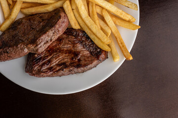 Churrasco - bife de picanha assada na brasa com batata frita