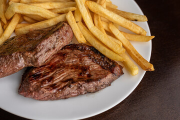Churrasco - bife de picanha assada na brasa com batata frita
