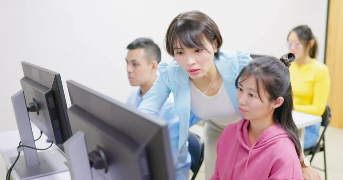 teacher in adult education class