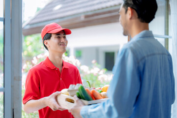 Parcel delivery staff deliver products to customers at their doorsteps.