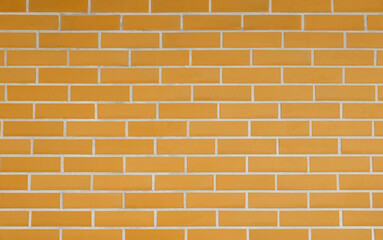 Texture of orange color brick wall as background