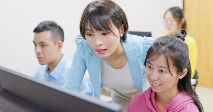 teacher in adult education class