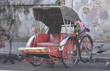 Decorated rickshaw on the street in Penang, Malaysia