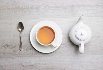 Cup of Tea on a light wooden background